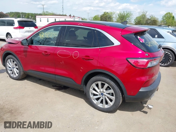 2021 Ford Escape Titanium Hybrid with VIN 1FMCU9DZ9MUA15184, listed as a IAAI auction lot 42093809 with 48,983 mi miles and . Bid and sale history available at DreamBid. Image 3.