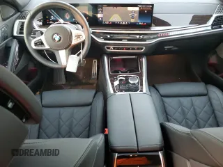 2025 BMW X6 xDrive40i with VIN 5UX33EX09S9Y26463, listed as a Copart auction lot 84269334 with 1,970 mi miles and Salvage Title. Bid and sale history available at carsss.com. Image 8.