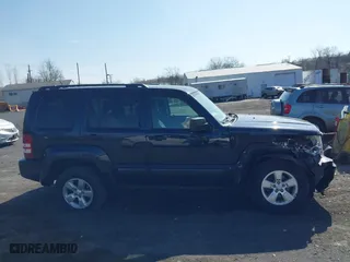 2011 Jeep Liberty Sport 70th Anniversary with VIN 1J4PN2GKXBW539030, listed as a IAAI auction lot 41913633 with 115,605 mi miles. Bid and sale history available at carsss.com. Image 13.