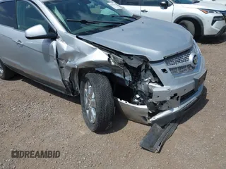 2012 Cadillac SRX Performance Collection with VIN 3GYFNBE37CS615517, listed as a IAAI auction lot 42541029 with 54,159 mi miles and . Bid and sale history available at DreamBid. Image 6.