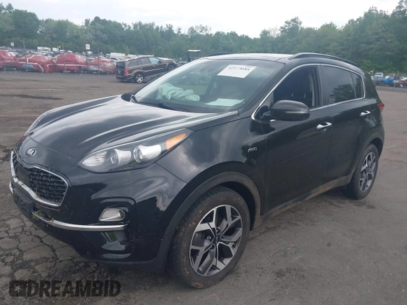 2021 Kia Sportage EX with VIN KNDPNCAC5M7848673, listed as a IAAI auction lot 42373684 with 108,409 mi miles and . Bid and sale history available at DreamBid. Image 2.