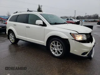2014 Dodge Journey R/T z VIN 3C4PDDFG4ET199515, wystawiony jako Copart lot #86354504 z przebiegiem 128 888 mil mil oraz Szkoda całkowita • Salvage title. Historia ofert i sprzedaży dostępna na DreamBid. Obrazek 4.