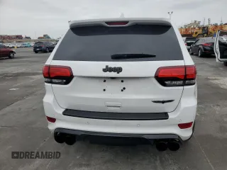 2018 Jeep Grand Cherokee Trackhawk with VIN 1C4RJFN91JC293695, listed as a Copart auction lot 59031525 with 8,565 mi miles and Salvage title. Bid and sale history available at DreamBid. Image 6.