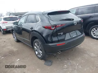 2023 Mazda CX-30 S Carbon Edition with VIN 3MVDMBCMXPM553129, listed as a IAAI auction lot 41864876 with 18,317 mi miles and . Bid and sale history available at DreamBid. Image 3.