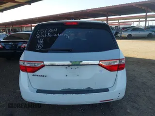 2012 Honda Odyssey EX-L with VIN 5FNRL5H67CB051764, listed as a IAAI auction lot 42493181 with 167,189 mi miles and . Bid and sale history available at DreamBid. Image 16.