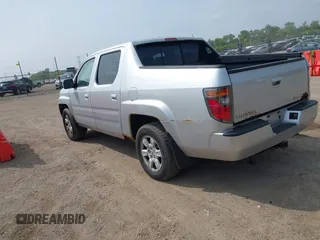 2007 Honda Ridgeline RTL z VIN 2HJYK16517H530890, wystawiony jako IAAI lot #42521976 z przebiegiem 285 222 mil mil oraz . Historia ofert i sprzedaży dostępna na DreamBid. Obrazek 3.