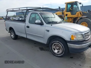 2000 Ford F-150 XL with VIN 1FTRF17W7YNB25369, listed as a IAAI auction lot 41701821 with 243,555 mi miles and . Bid and sale history available at DreamBid. Image 1.