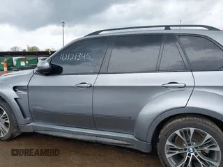2011 BMW X5 35d z VIN 5UXZW0C52BL661879, wystawiony jako IAAI lot #42121345 z przebiegiem 131 036 mil mil oraz . Historia ofert i sprzedaży dostępna na DreamBid. Obrazek 14.