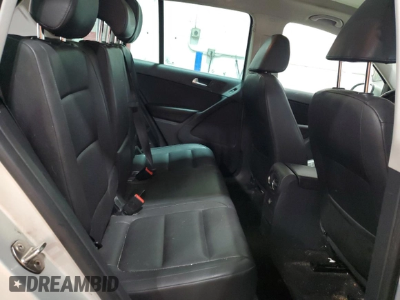 2013 Volkswagen Tiguan SE z VIN WVGBV3AX1DW579506, wystawiony jako Copart lot #52719575 z przebiegiem 163 471 mil mil oraz Szkoda całkowita • Salvage title. Historia ofert i sprzedaży dostępna na DreamBid. Obrazek 11.