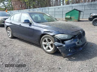 2013 BMW 3 Series 328i xDrive with VIN WBA3B5G59DNS01455, listed as a IAAI auction lot 41788947 with 127,677 mi miles. Bid and sale history available at carsss.com. Image 1.