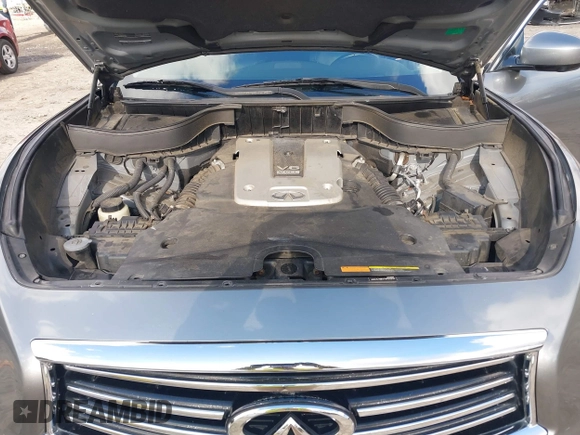 2015 Infiniti QX70 with VIN JN8CS1MWXFM480906, listed as a IAAI auction lot 41177811 with 176,527 mi miles and . Bid and sale history available at DreamBid. Image 10.