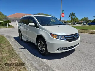 2017 Honda Odyssey Touring с VIN 5FNRL5H91HB008068, выставлен на аукционе Copart как лот 49853805 с пробегом 33 521 миль миль и Чистый • Clean title. История ставок и продаж доступна на DreamBid. Изображение 1.