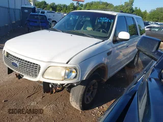 1999 Ford Expedition XLT with VIN 1FMRU1761XLA56030, listed as a IAAI auction lot 42703533 with Not provided miles and . Bid and sale history available at DreamBid. Image 2.