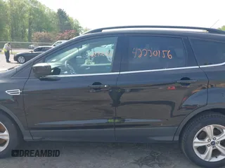 2014 Ford Escape SE with VIN 1FMCU9GXXEUD40924, listed as a IAAI auction lot 42230156 with 190,238 mi miles and . Bid and sale history available at DreamBid. Image 14.