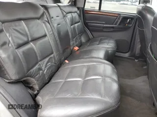 1997 Jeep Grand Cherokee Limited with VIN 1J4GZ78Y4VC693193, listed as a Copart auction lot 46327885 with 235,553 mi miles and Salvage Title. Bid and sale history available at carsss.com. Image 10.