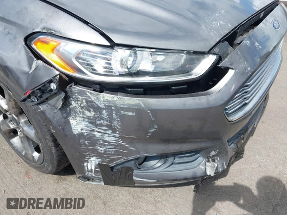 2013 Ford Fusion SE z VIN 3FA6P0HR1DR161025, wystawiony jako IAAI lot #42783917 z przebiegiem 172 329 mil mil oraz . Historia ofert i sprzedaży dostępna na DreamBid. Obrazek 6.