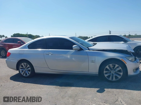 2013 BMW 3 Series 328i xDrive with VIN WBAKF5C50DJ297831, listed as a IAAI auction lot 41894859 with 87,174 mi miles. Bid and sale history available at carsss.com. Image 13.