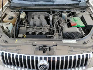 2007 Mercury Montego Premier z VIN 1MEHM42157G608181, wystawiony jako Copart lot #44276675 z przebiegiem 186 917 mil mil oraz Tytuł czysty. Historia ofert i sprzedaży dostępna na DreamBid. Obrazek 11.