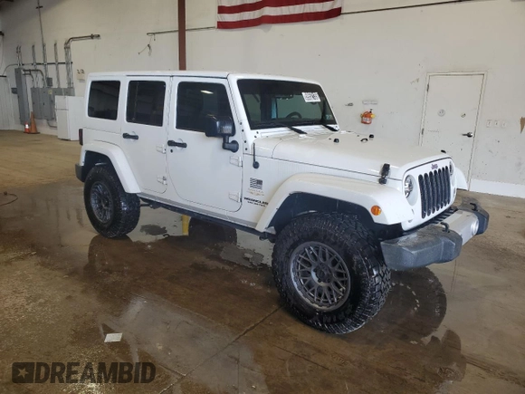 2015 Jeep Wrangler Unlimited Sahara с VIN 1C4HJWEG0FL560973, выставлен на аукционе Copart как лот 59552135 с пробегом 135 057 миль миль и Чистый • Clean title. История ставок и продаж доступна на DreamBid. Изображение 4.
