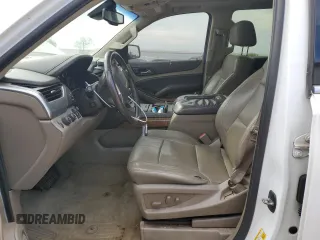 2015 Chevrolet Tahoe LTZ with VIN 1GNSKCKC1FR310018, listed as a Copart auction lot 71798454 with 244,179 mi miles and Salvage title. Bid and sale history available at DreamBid. Image 7.