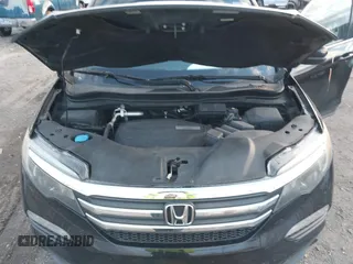 2016 Honda Pilot EX-L with VIN 5FNYF5H56GB031831, listed as a IAAI auction lot 41111342 with 244,197 mi miles and . Bid and sale history available at DreamBid. Image 10.