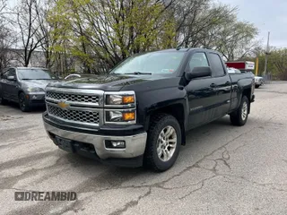 2014 Chevrolet Silverado 1500 LT with VIN 1GCVKREH1EZ169899, listed as a IAAI auction lot 42143501 with 124,789 mi miles and . Bid and sale history available at DreamBid. Image 2.