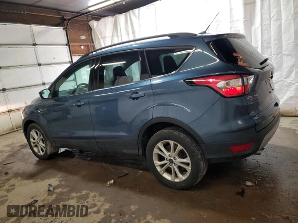 2018 Ford Escape SE z VIN 1FMCU9GD6JUC30324, wystawiony jako Copart lot #55833765 z przebiegiem 48 016 mil mil oraz Szkoda całkowita • Salvage title. Historia ofert i sprzedaży dostępna na DreamBid. Obrazek 2.