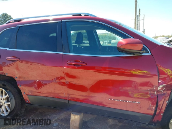 2015 Jeep Cherokee North with VIN 1C4PJMCSXFW654090, listed as a IAAI auction lot 41844434 with 198,592 mi miles. Bid and sale history available at carsss.com. Image 13.