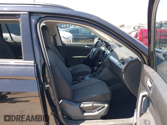 2021 Volkswagen Tiguan S with VIN 3VV1B7AX9MM067347, listed as a IAAI auction lot 42305101 with 77,042 mi miles and . Bid and sale history available at DreamBid. Image 5.