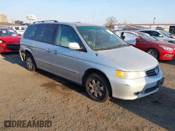 2004 Honda Odyssey EX-L with VIN 5FNRL18964B025323, listed as a IAAI auction lot 40714457 with 164,786 mi miles and . Bid and sale history available at DreamBid. Image 1.