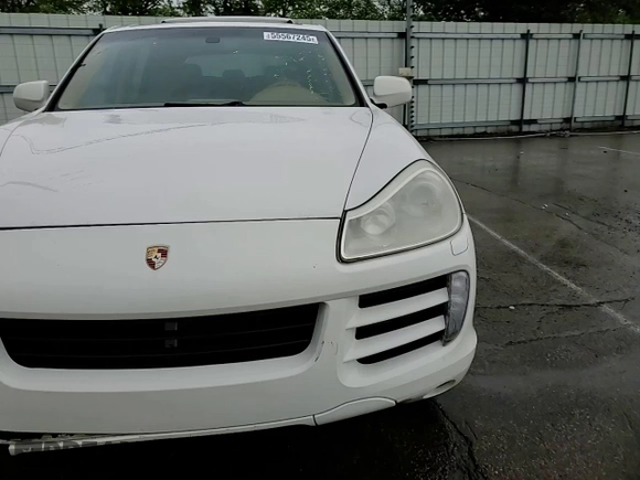 2009 Porsche Cayenne z VIN WP1AA29P09LA02631, wystawiony jako Copart lot #55567245 z przebiegiem 187 609 mil mil oraz Szkody całkowita. Historia ofert i sprzedaży dostępna na DreamBid. Obrazek 14.