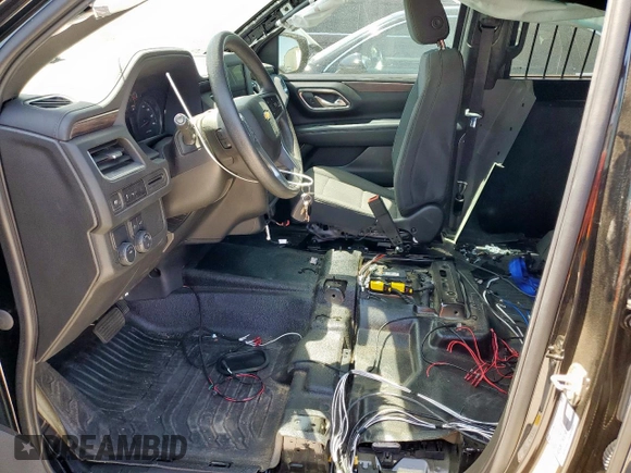 2023 Chevrolet Tahoe Commercial with VIN 1GNSCLEDXPR447042, listed as a Copart auction lot 52399275 with 22,205 mi miles and Salvage title. Bid and sale history available at DreamBid. Image 7.