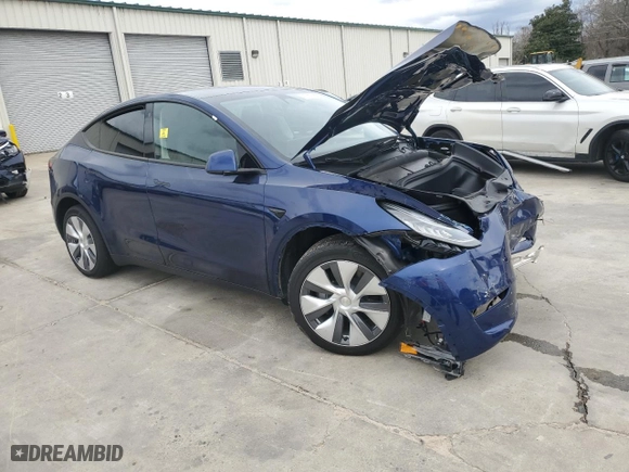 2023 Tesla Model Y Long Range with VIN 7SAYGDEE2PA096705, listed as a Copart auction lot 47790545 with 9,195 mi miles and Salvage Title. Bid and sale history available at carsss.com. Image 4.