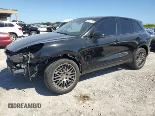 2018 Porsche Cayenne z VIN WP1AA2A23JKA00043, wystawiony jako Copart lot #51791315 z przebiegiem 71 733 mil mil oraz Szkody całkowita. Historia ofert i sprzedaży dostępna na DreamBid. Obrazek 1.