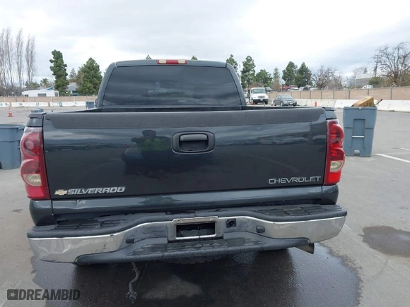 2003 Chevrolet Silverado 1500 LS with VIN 1GCEK19TX3E107860, listed as a IAAI auction lot 41461401 with 379,055 mi miles. Bid and sale history available at carsss.com. Image 16.