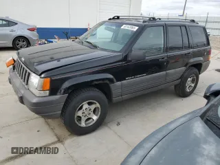 1996 Jeep Grand Cherokee with VIN 1J4EZ58S8TC106529, listed as a Copart auction lot 50163965 with 226,951 mi miles and Salvage title. Bid and sale history available at DreamBid. Image 1.