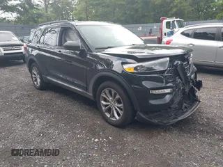 2022 Ford Explorer XLT z VIN 1FMSK8DH9NGA52903, wystawiony jako IAAI lot #42704656 z przebiegiem 63 591 mil mil oraz . Historia ofert i sprzedaży dostępna na DreamBid. Obrazek 1.