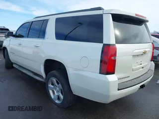 2015 Chevrolet Suburban LT with VIN 1GNSKJKC0FR309866, listed as a IAAI auction lot 41743848 with 220,778 mi miles and . Bid and sale history available at DreamBid. Image 3.