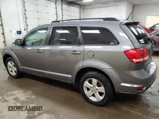 2012 Dodge Journey SXT with VIN 3C4PDCBG1CT353210, listed as a Copart auction lot 48863415 with 122,904 mi miles and Clean title. Bid and sale history available at DreamBid. Image 2.