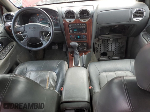 2002 GMC Envoy SLT z VIN 1GKDT13S022212095, wystawiony jako Copart lot #51253585 z przebiegiem 194 767 mil mil oraz Szkoda całkowita • Salvage title. Historia ofert i sprzedaży dostępna na DreamBid. Obrazek 8.