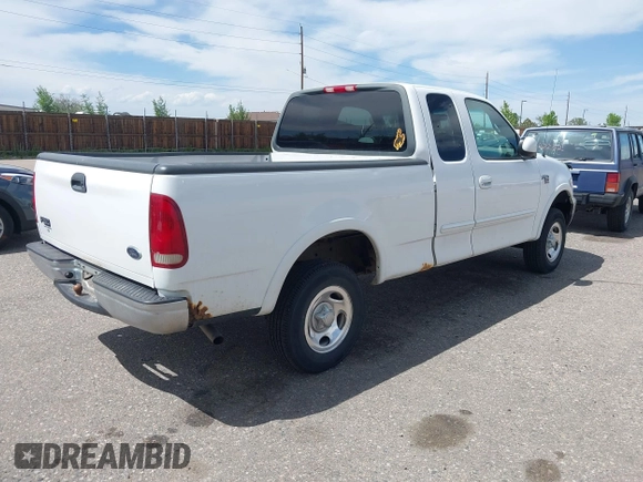 2001 Ford F-150 XL z VIN 1FTRX18W31KF80478, wystawiony jako IAAI lot #42219605 z przebiegiem 127 284 mil mil oraz . Historia ofert i sprzedaży dostępna na DreamBid. Obrazek 4.