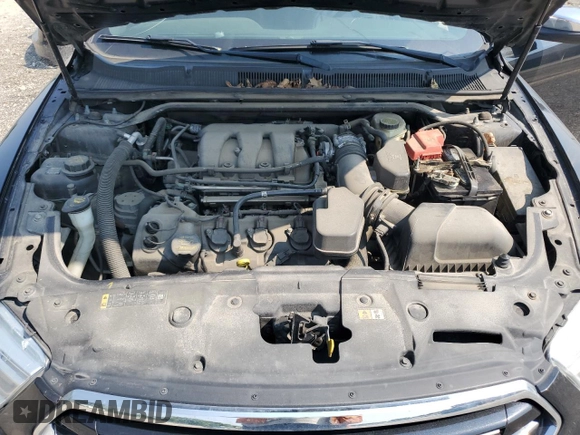 2013 Ford Taurus Limited z VIN 1FAHP2F80DG210284, wystawiony jako Copart lot #60356585 z przebiegiem 163 750 mil mil oraz Szkoda całkowita • Salvage title. Historia ofert i sprzedaży dostępna na DreamBid. Obrazek 11.