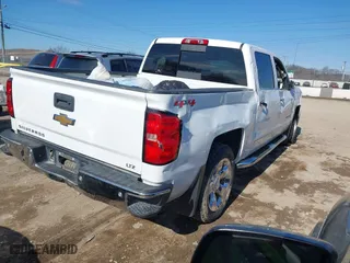 2015 Chevrolet Silverado 1500 LTZ with VIN 3GCUKSEC2FG143790, listed as a IAAI auction lot 41402254 with 122,827 mi miles. Bid and sale history available at carsss.com. Image 4.