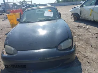 1999 Mazda MX-5 Miata with VIN JM1NB3539X0112181, listed as a IAAI auction lot 42397232 with 11 mi miles and . Bid and sale history available at DreamBid. Image 12.