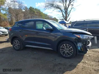 2021 Hyundai Tucson Sport with VIN KM8J3CAL6MU389601, listed as a IAAI auction lot 40985601 with 66,013 mi miles. Bid and sale history available at carsss.com. Image 14.