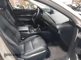 2024 Mazda CX-30 S Preferred with VIN 3MVDMBCM6RM609392, listed as a IAAI auction lot 42519708 with 40,757 mi miles and . Bid and sale history available at DreamBid. Image 5.