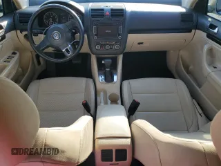 2010 Volkswagen Jetta SE with VIN 3VWRX7AJ1AM048637, listed as a Copart auction lot 57045965 with 158,297 mi miles and Salvage title. Bid and sale history available at DreamBid. Image 8.