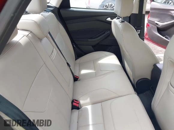 2016 Ford Focus Titanium with VIN 1FADP3J22GL314021, listed as a IAAI auction lot 42212462 with 142,370 mi miles and . Bid and sale history available at DreamBid. Image 8.