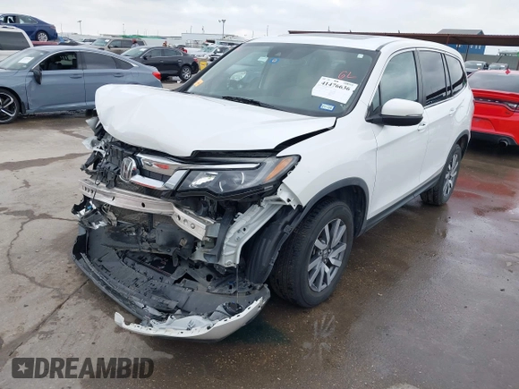 2021 Honda Pilot EX-L with VIN 5FNYF6H55MB031305, listed as a IAAI auction lot 41476636 with 58,754 mi miles. Bid and sale history available at carsss.com. Image 19.