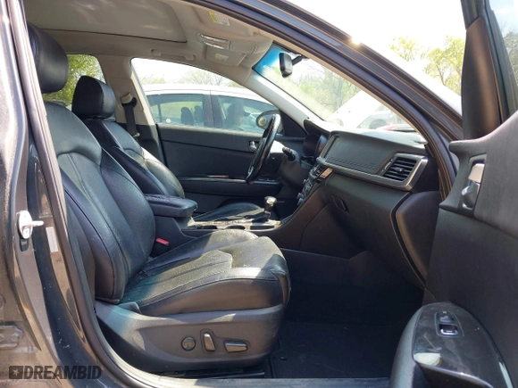 2016 Kia Optima EX with VIN 5XXGU4L38GG022501, listed as a IAAI auction lot 42071944 with 122,502 mi miles. Bid and sale history available at carsss.com. Image 5.